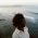 The above is a picture of Eugenia as she enjoys viewing the Indian Ocean from a vantage point